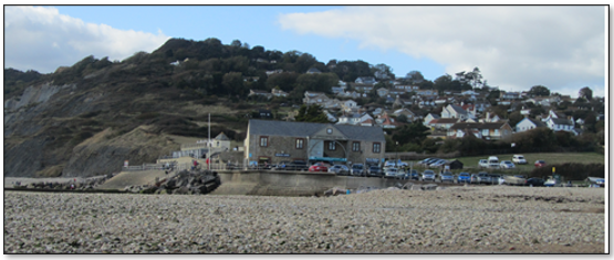 Photo showing the proximity to the beach to the Old Cement Factory building with the Heritage Coast Centre, car parking, and the position of coastal defences.