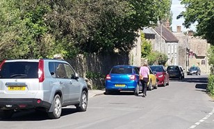 Parking in Yetminster High Street halving the road width