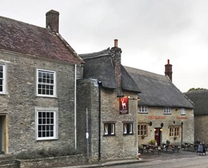 Photo: Yetminster High Street showing varying rooflines